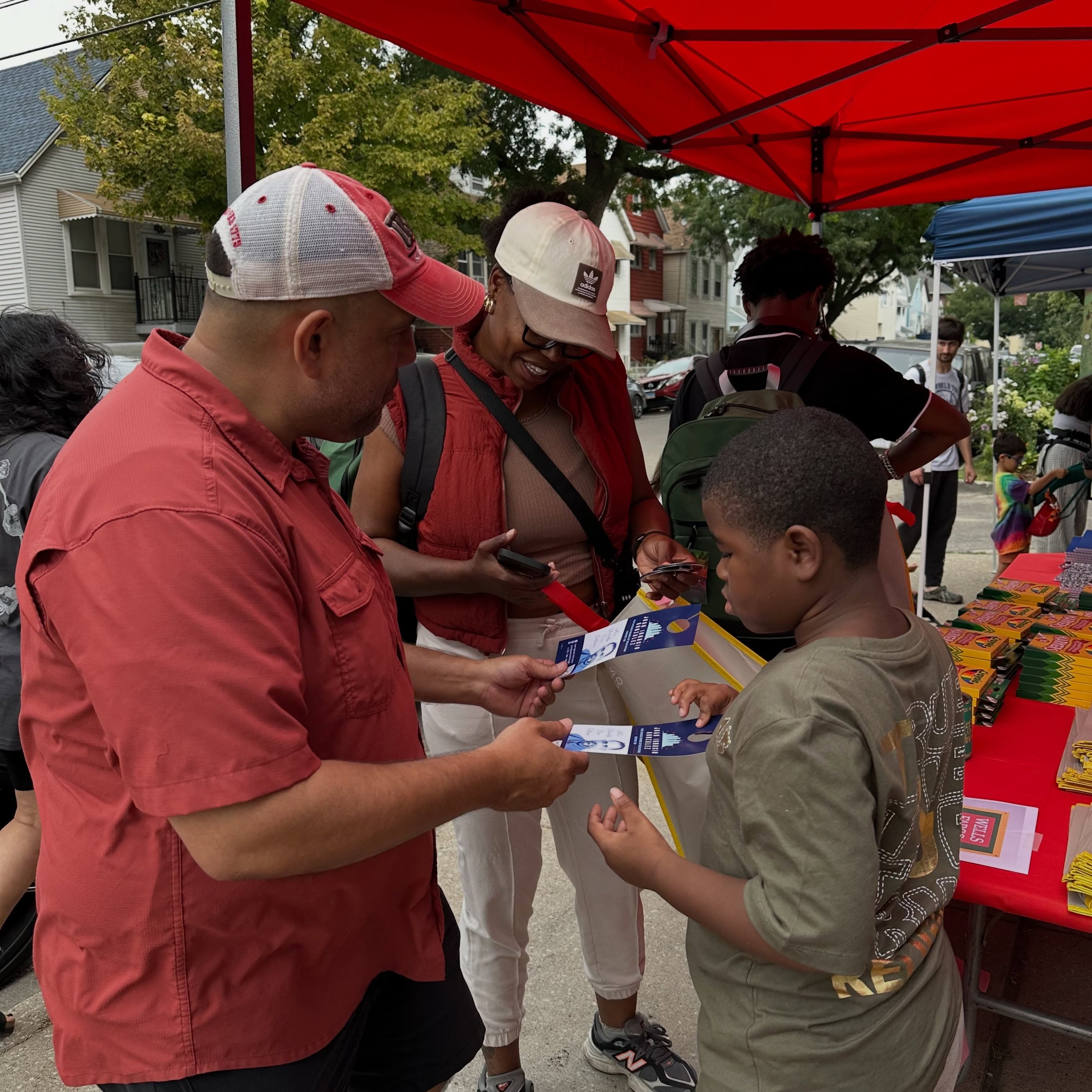 Ignacio Gonzalez, U.S. Marine Corps veteran and owner of Dreamcatcher Café, at the 2026 Back to School Community Day in Chicago's Back of the Yards neighborhood