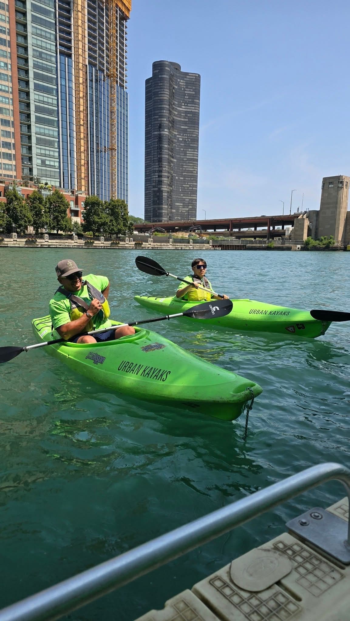 Veteran kayakers approaching the bridge on the Chicago River