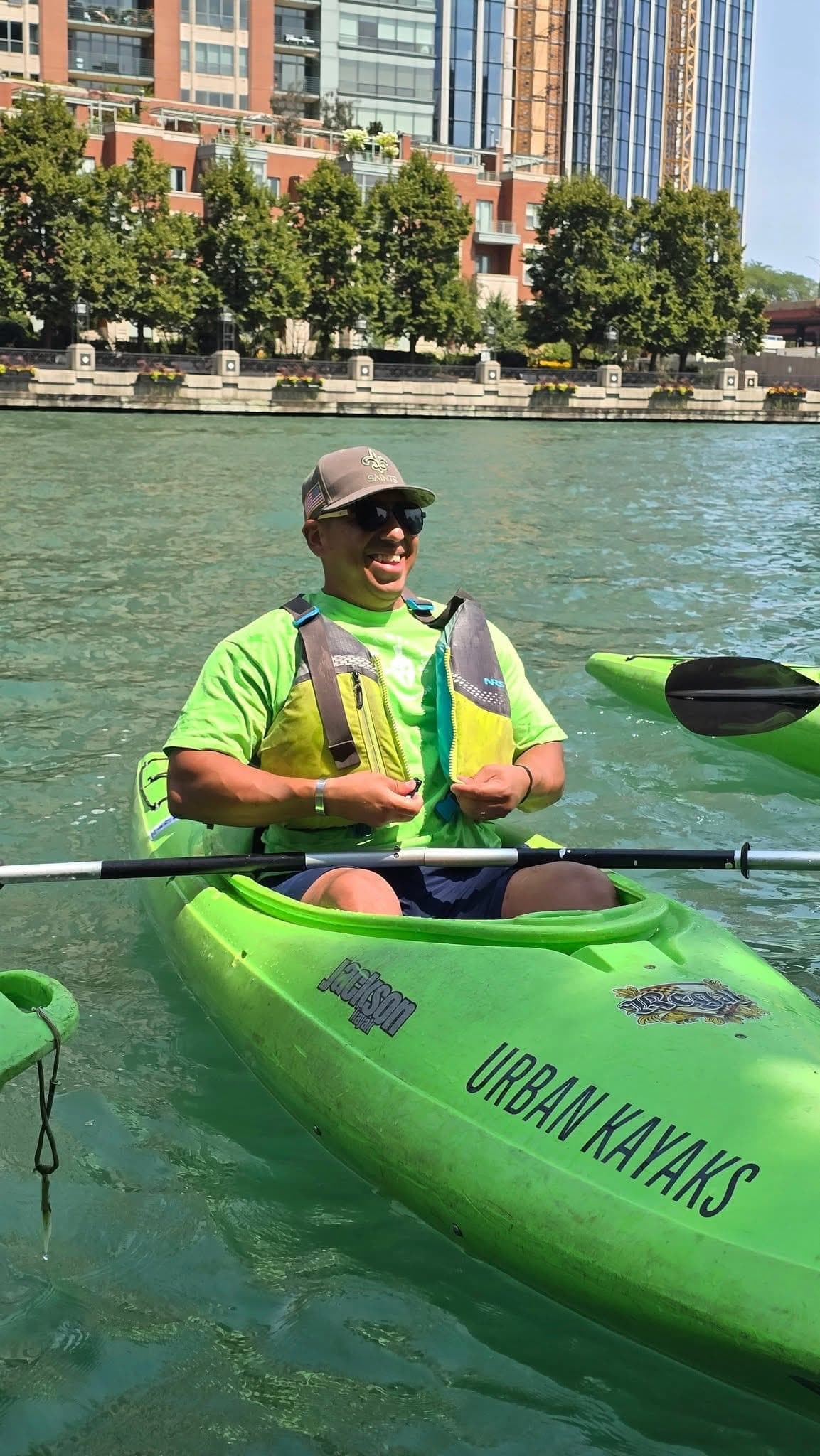 Veteran kayak team paddling together on the Chicago River